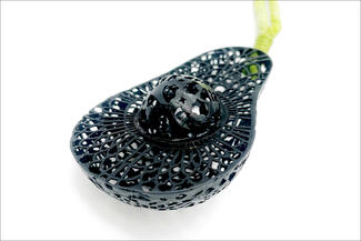 Wood.steel cut out avocado